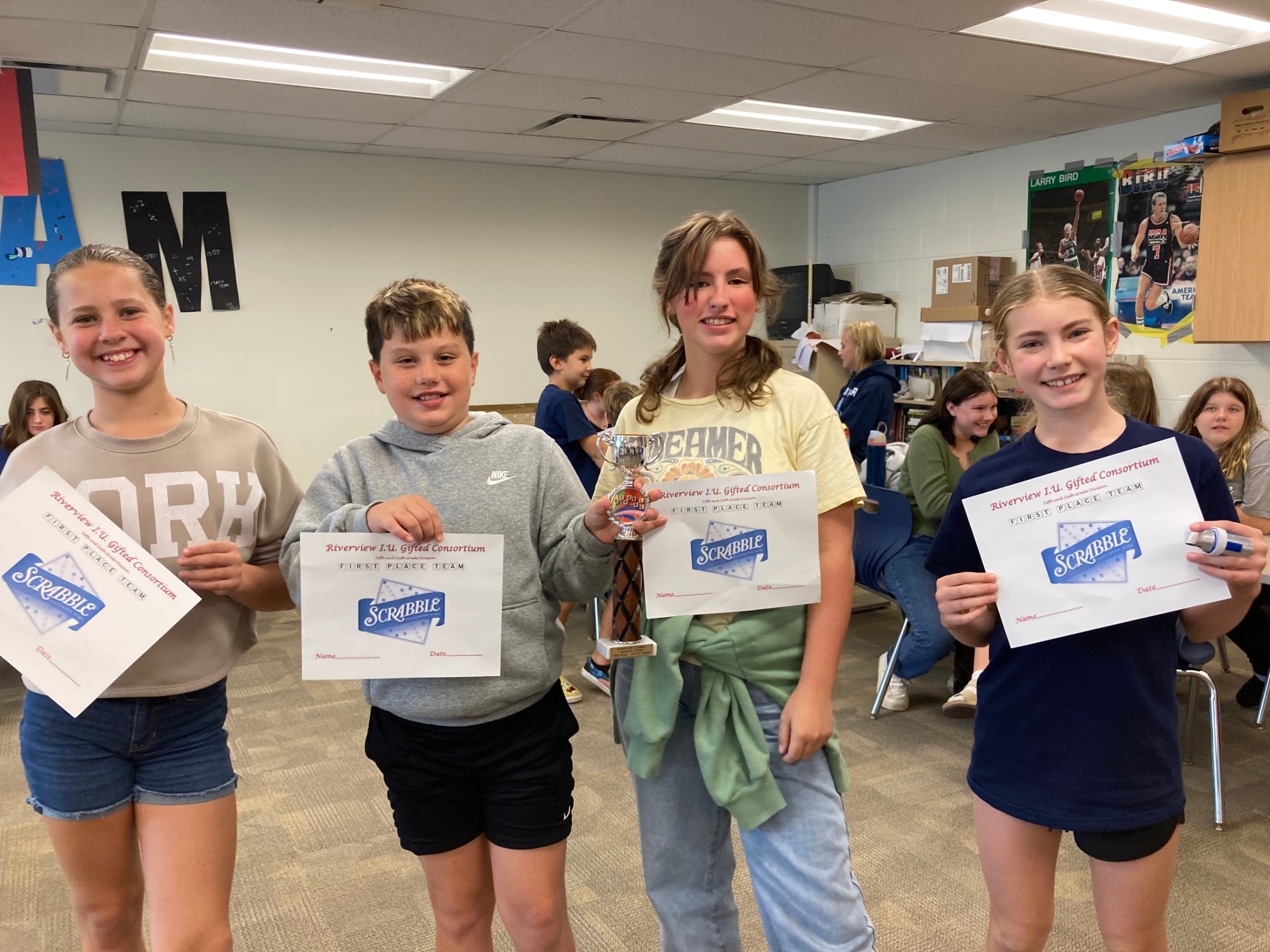 Scrabble competition champs from Hickory Grove pose for a photo with their certificates.